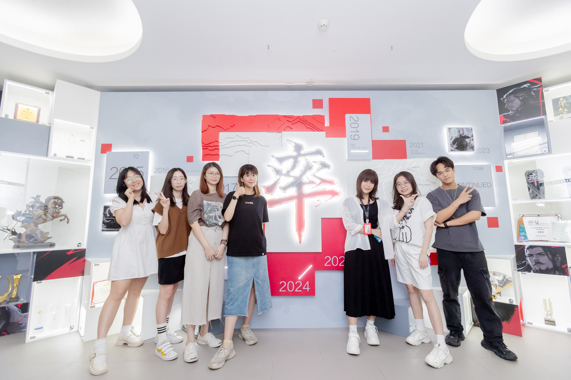 The team in front of the finished wall